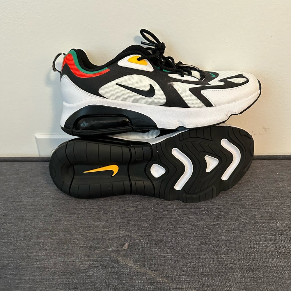 NIKE- NEW- men’s size 9!